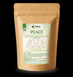 two crazy cat ladies feline essential cat  Peace garden label with graphic of two cats face to face in peace. on a brown kraft bag.