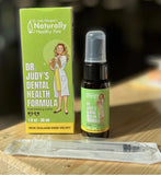 Dr. Judy's Dental Health Formula spray bottle with syringe 